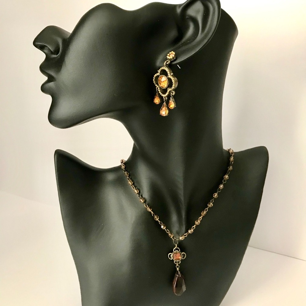 Necklace and earrings.